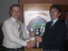 South West Chairman Leo Heatley presents the Abbey Cup to Junior Hurling vice captain Damien Mc Gaughey